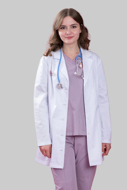 Person wearing a white lab coat and stethoscope on a pink background