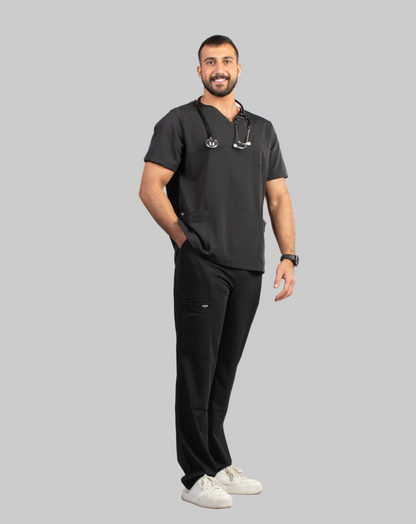Man wearing a black scrub set with 'Pulse' branding on a white background